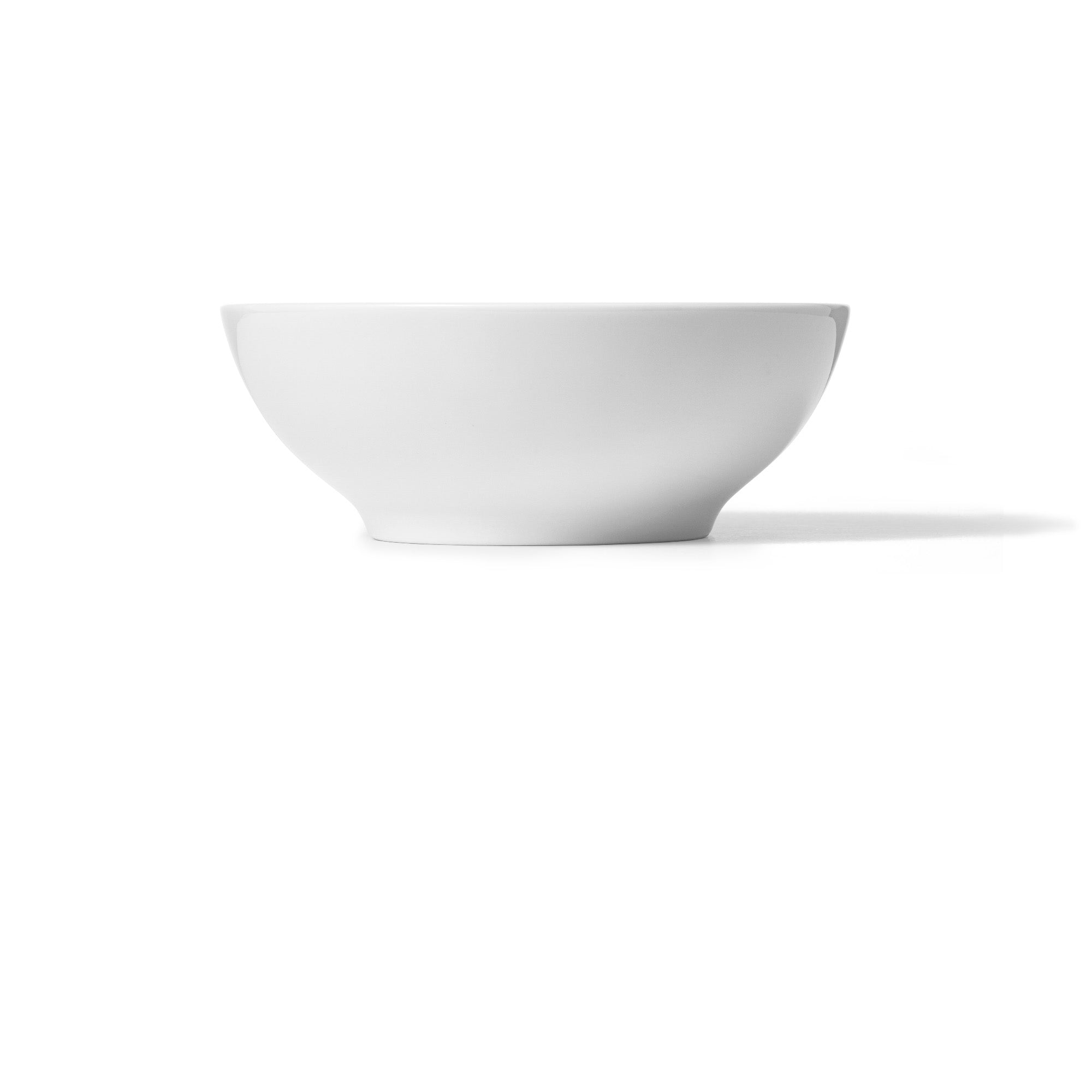 Side view of German-made porcelain breakfast bowl with hand-illustrated design