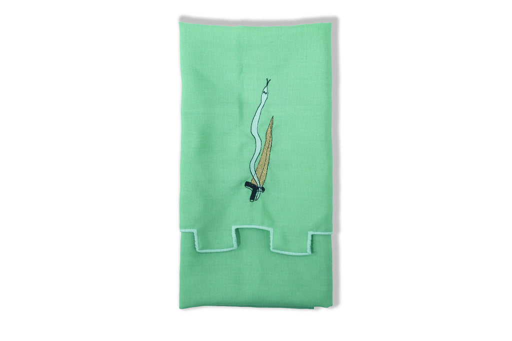 Green linen tea towel or napkin with a sword design embroidered