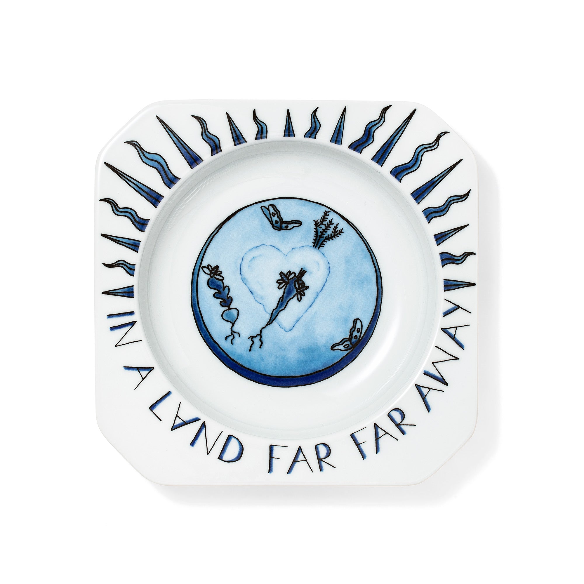 cobalt blue china with a hand illustrated sun 